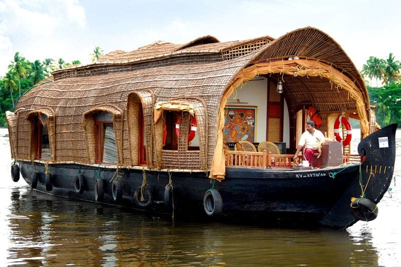 Luxury traditional Kerala houseboat cruising in Alleppey backwaters